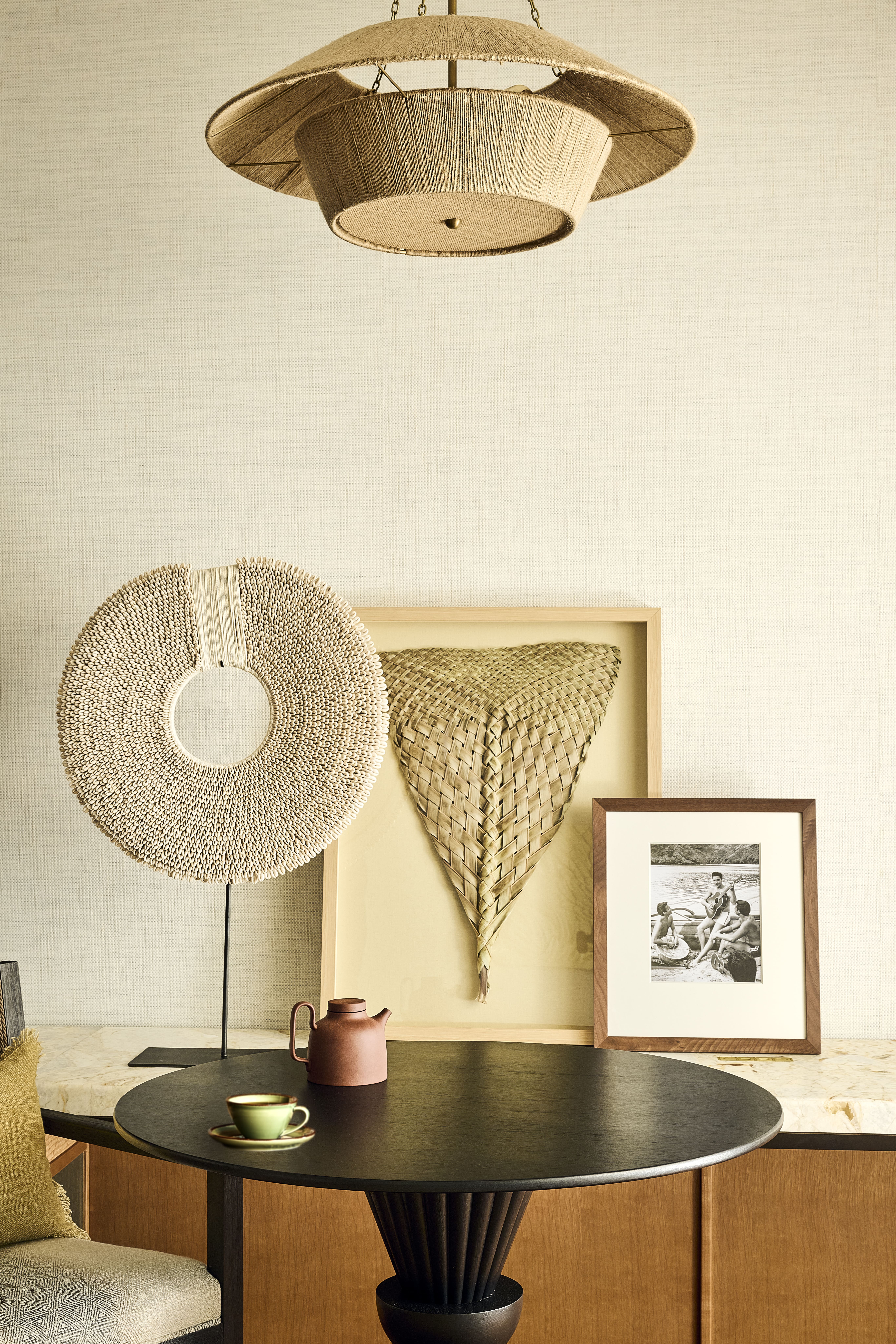 Textile and fiber arts match the Hawaiian energy in a sitting room at the Four Seasons Maui suites.