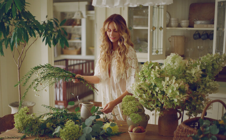 Kendall Knox arranges florals.